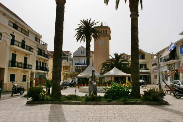 A photo of the Bell Square in the city of Argostoli with the clocktower in the background.