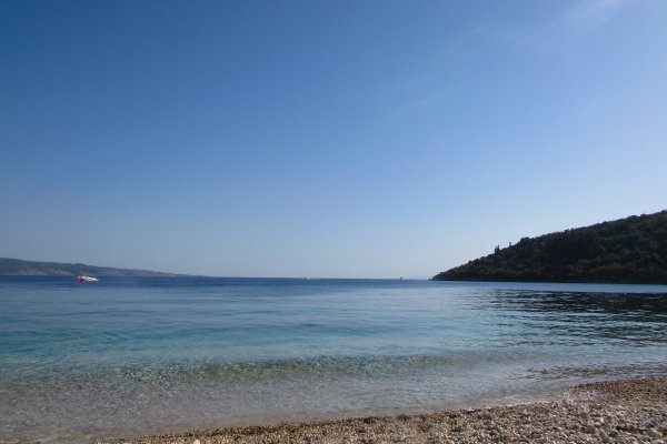 Shades of blue and green over the pebble beach of Kerasia, Kassiopi.