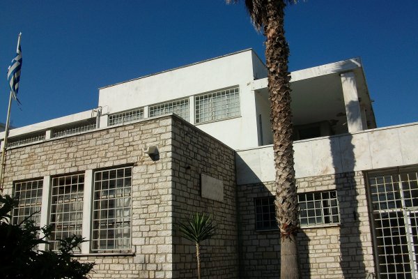 The exterior of the Archaeological Museum of Corfu including the yard and the main entrance.