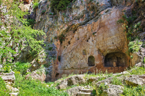 A picture of a cave-like rock carving where Castalia Spring is located.