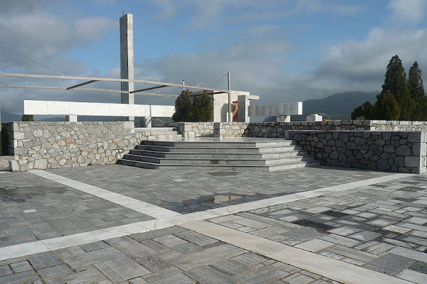 The Mausoleum of Distomo is a minimalist contemporary monument built with grey stones.