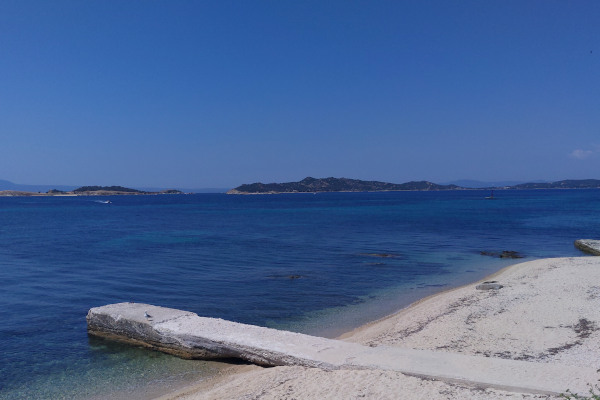 A picture of an old cement pier on Drenia Island in Halkidiki.