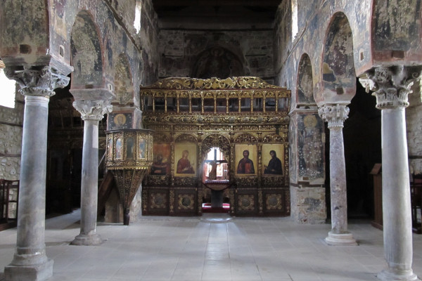 The main hall inside the church of the Koimisis in Edessa with massive columns.