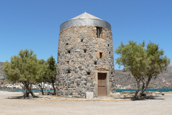 An old stone-built windmill at the area Poros close to Elounta.