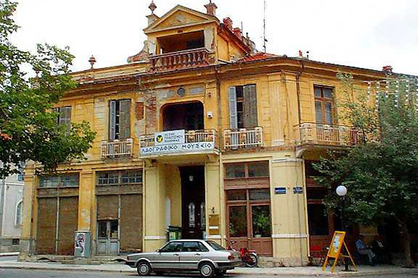 The old building that houses the Cultural Club Of Florina is artfully decorated.