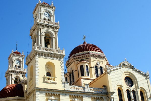 Agios Minas Cathedral is painted yellow, and it has two belfries and a dome covered with tiles. 