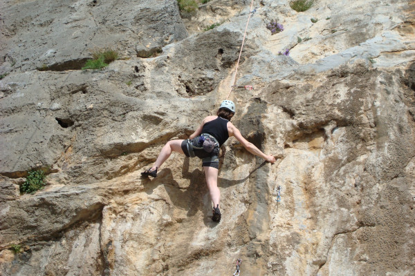 A picture of a climber during the climbing process on the island of Kalymnos.