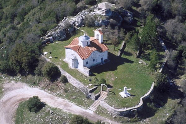 An aerial photo of the Church of St. Demetriοs located on the top of the homonymous hill of Karpenisi.