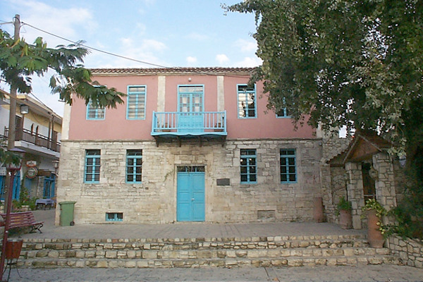 The main entrance of the stone-built building that houses the Folklore Museum of Afitos.