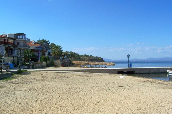 The Nea Fokea Beach and the pier in the middle.