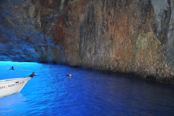 A picture taken inside the Blue Cave of Kastellorizo where the dazzling blue color of the reflected sun is visible.