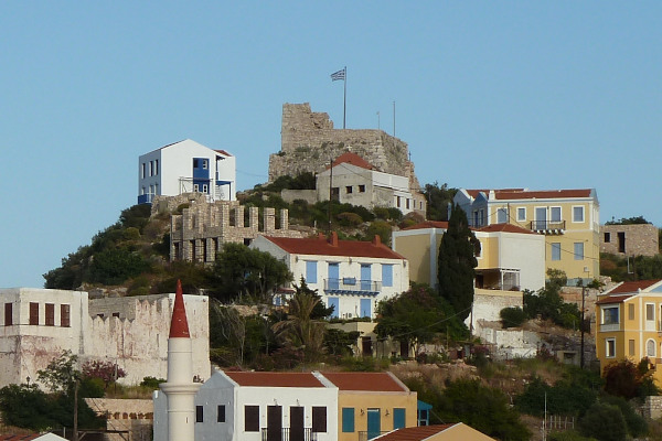 A picture of the Medieval Castle of Kastellorizo and building of the settlement around it.