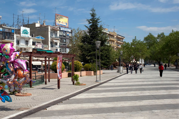 People having their walk at the central square of Komotini (Irinis Square).