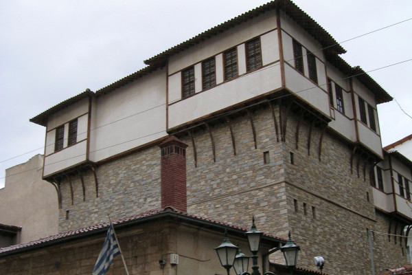 A picture of a building that houses the Historical - Folklore and Natural History Museum of Kozani.