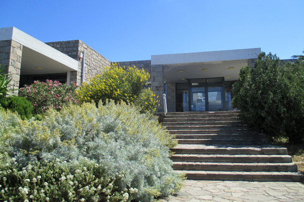 Part of the outer yard and the main entrance of the Natural History Museum of the Lesvos Petrified Forest.