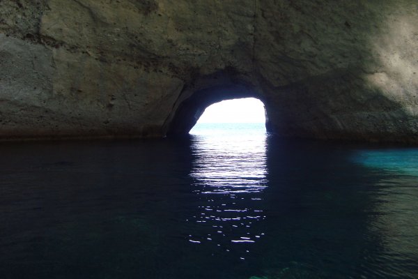 A passage between the sea and the rock at Sikia (Cave) Beach, Melos. 