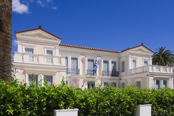 The Nafplio National Gallery is a neoclassical building with pediments and balconies.
