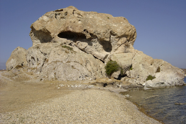 A picture of the big rock (petra) located at the end of Petra Beach on Patmos.
