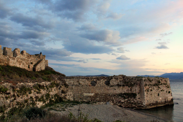 A picture of the walls of Pantocrator Castle at the coast of Preveza that reach the seawater.