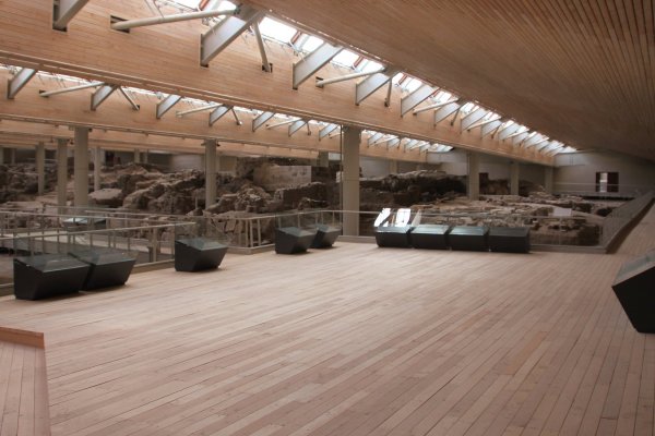 A wooden construction built around the remains of the ancient village of Akrotiri.