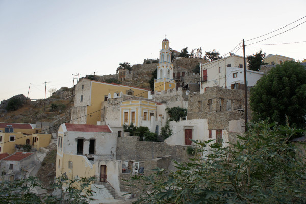 The hill of the Symi acropolis including other buildings and the ruins of the castle.