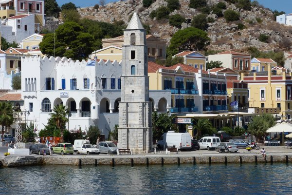 A picture of the clock tower of Symi at the entrance of the port of the island.