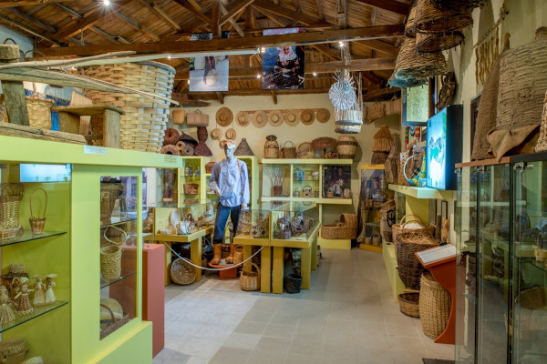 A picture from the interior of the basketry museum of Komotini showing the various exhibits.