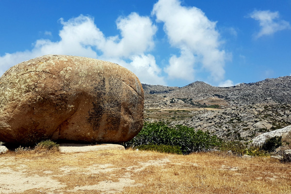 A huge round granite rock as a characteristic element of the area of Volax on the island of Tinos.